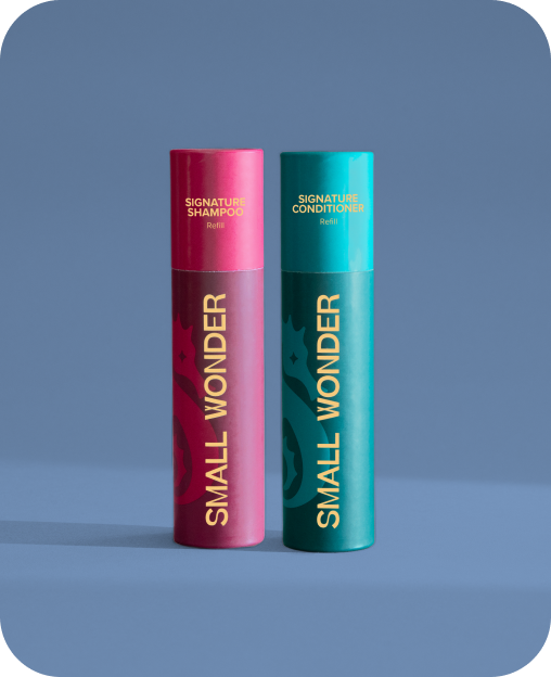 Two Small Wonder refill tubes, one red Signature Shampoo & one teal Signature Conditioner. 